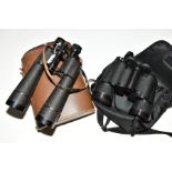A PAIR OF LIEBERMAN AND GORTZ 21 X 47 BINOCULARS, some wear and paint loss, in distressed leather