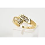 AN 18CT GOLD DIAMOND RING, of crossover design set with ten baguette/tapered baguette cut diamonds