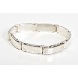 A SILVER TIFFANY & CO BRACELET, a gentleman's solid silver panel bracelet, diameter 65mm, stamped