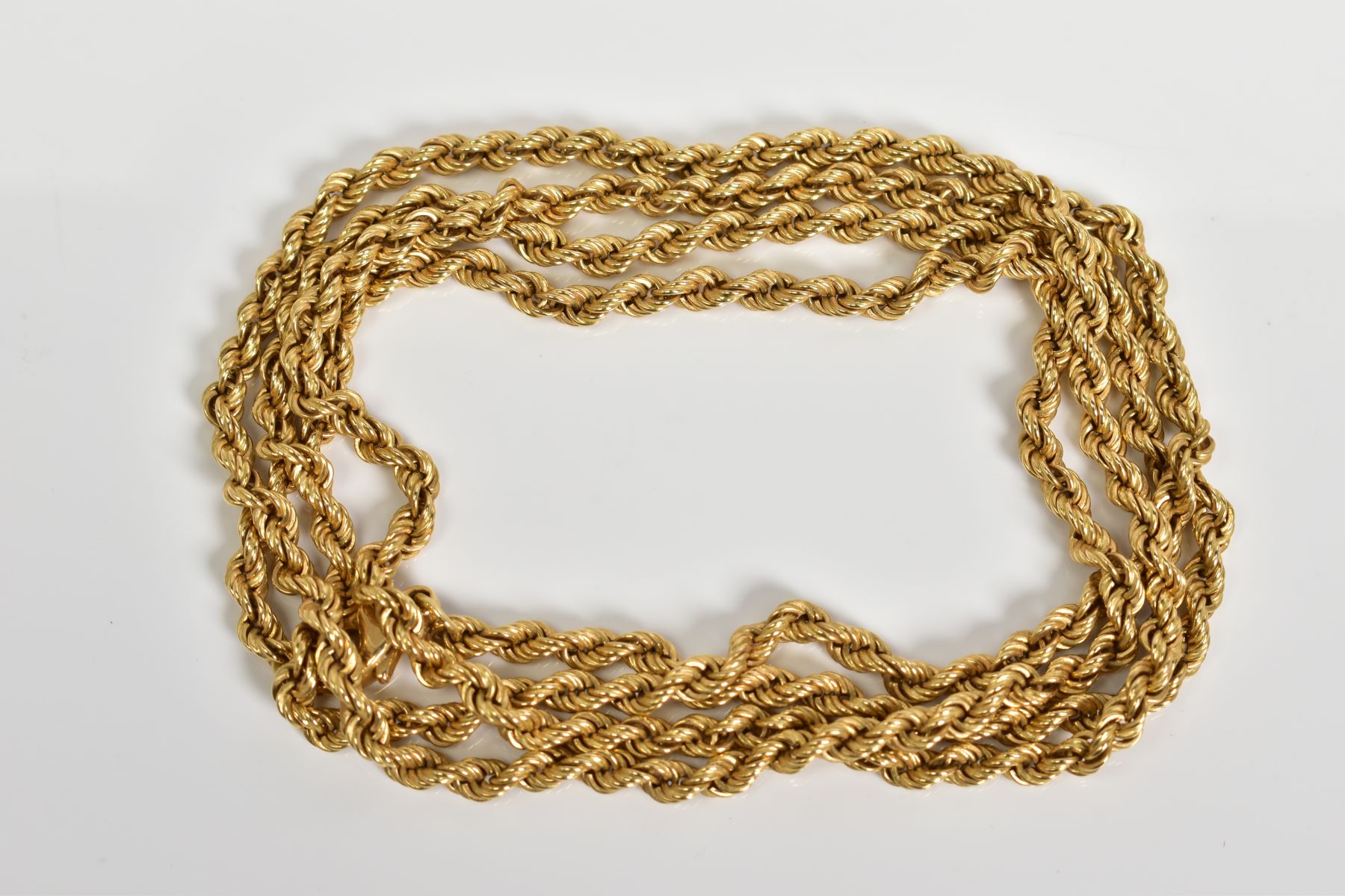 AN 18CT GOLD CHAIN, of rope design to the lobster claw clasp, with an 18ct hallmark for London,