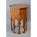 AN ARTS AND CRAFTS LIBERTY STYLE MOORISH OCCASIONAL TABLE, the octagonal top and box painted with