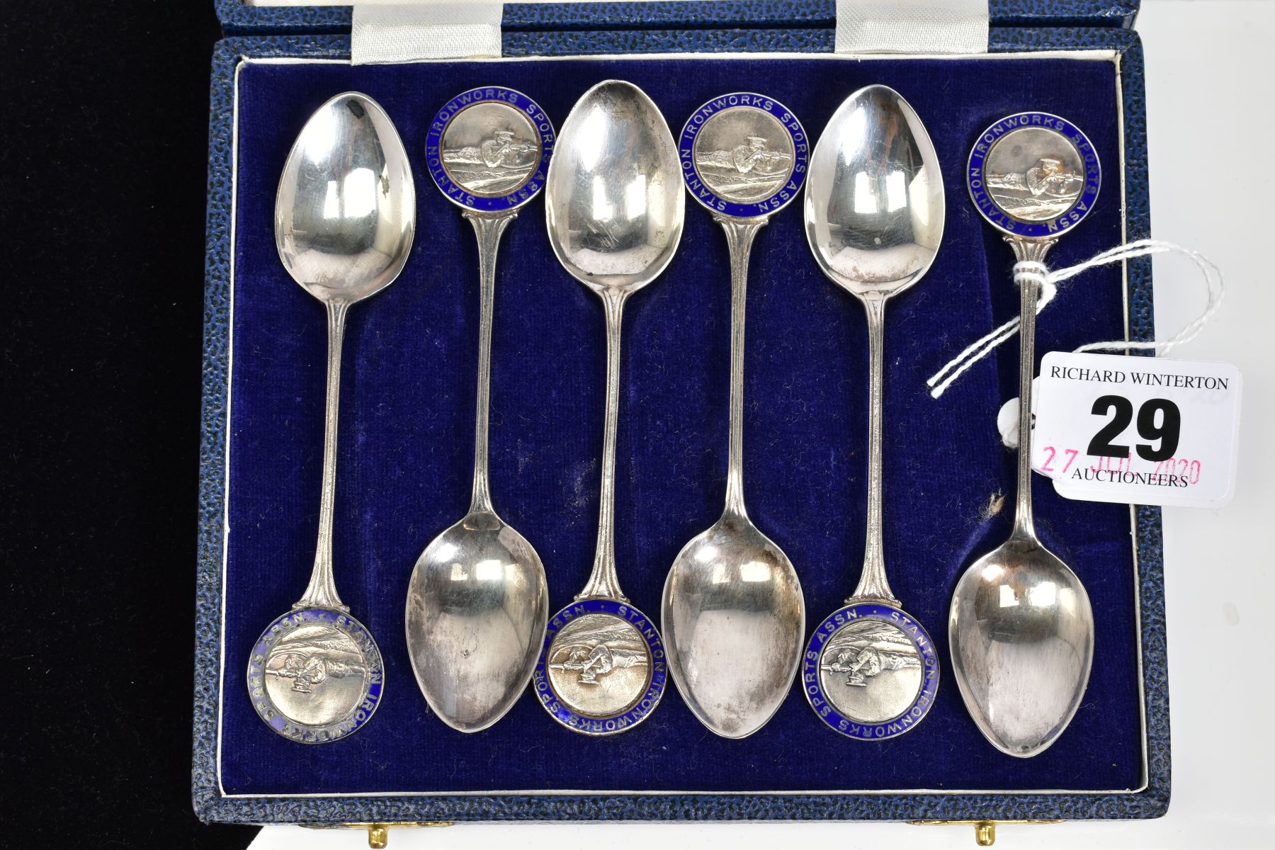 A SET OF SIX SILVER TEASPOONS, each with a round blue enamel medal depicting a rifle men, to each