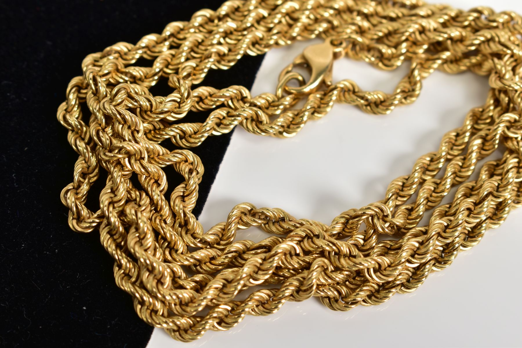 AN 18CT GOLD CHAIN, of rope design to the lobster claw clasp, with an 18ct hallmark for London, - Image 2 of 2