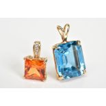 TWO PENDANTS, the first a cushion cut blue stone assessed as topaz within a four claw setting,