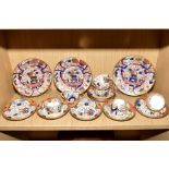 A SET OF SIX EARLY 19TH CENTURY SPODE TEA CUPS AND SEVEN MATCHING SAUCERS, decorated in the Imari