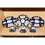 A ROYAL WORCESTER THREE PIECE DESSERT SERVICE, scale blue and gilt ground decorated with vignettes