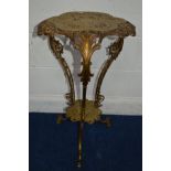 A BREVETTO BRASS TRIPLE TIER TORCHERE STAND, with foliate pierced decoration on triple scrolled legs