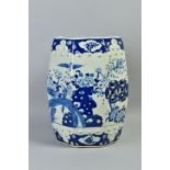 A CHINESE OCTAGONAL POTTERY GARDEN SEAT, decorated in underglaze blue with prunus blossom, birds and