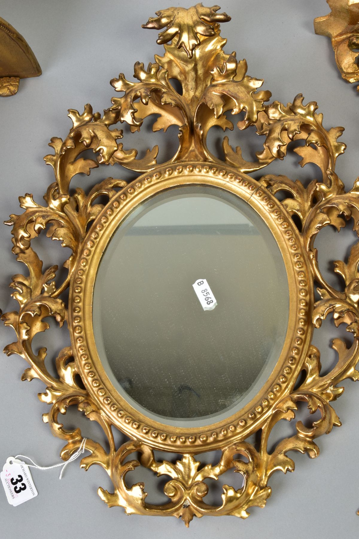 A COLLECTION OF SIX GILTWOOD ITEMS, comprising two small oval mirrors within ornate foliate - Image 2 of 5