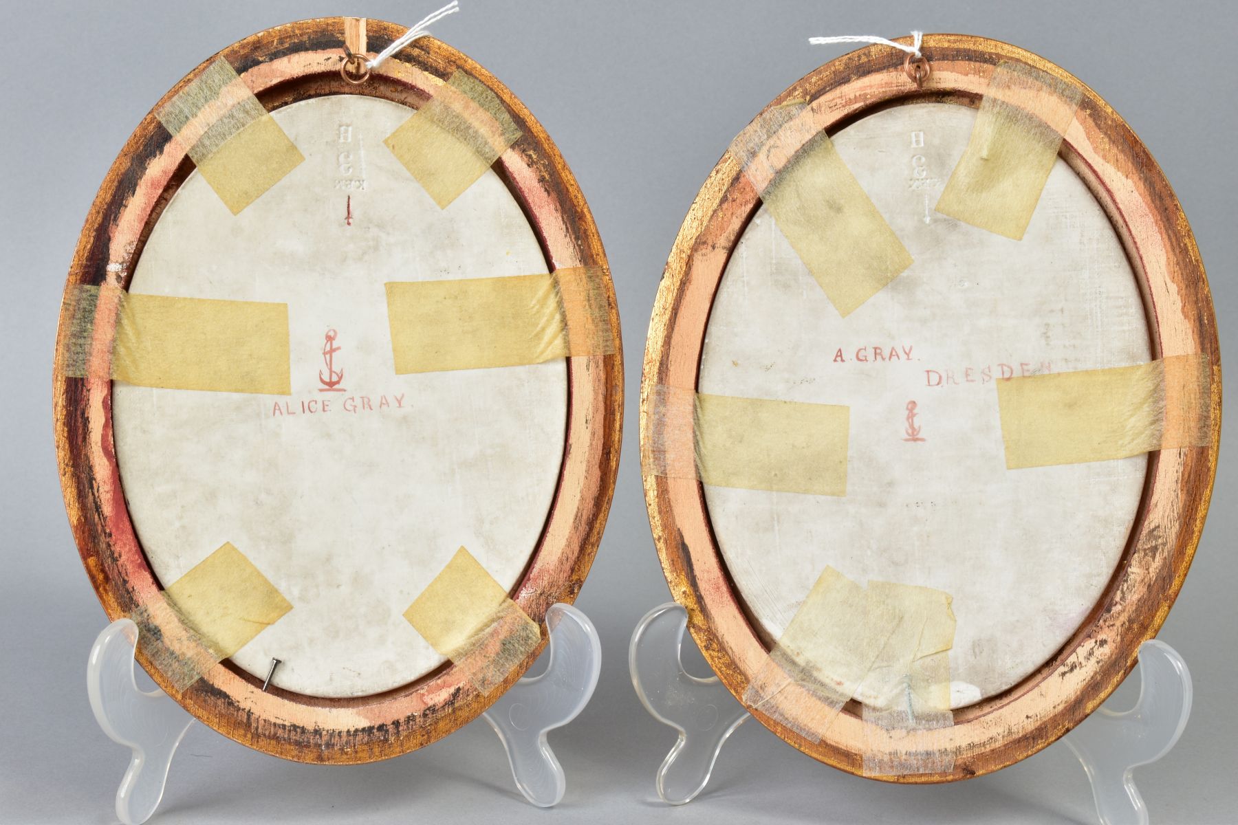 A PAIR OF 19TH CENTURY KPM PORCELAIN OVAL PLAQUES, painted with portraits of a 17th Century boy - Image 4 of 4