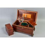 AN EARLY 19TH CENTURY MAHOGANY AND BOXWOOD STRUNG TEA CADDY OF SARCOPHAGUS FORM, the hinged lid