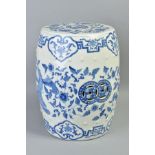 A CHINESE POTTERY GARDEN STOOL OF BARREL FORM, decorated in underglaze blue with exotic birds,