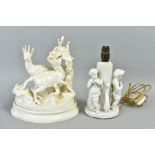 AN EARLY 20TH CENTURY BERLIN PORCELAIN FIGURE GROUP OF TWO DEER GRAZING, white glazed, model No.