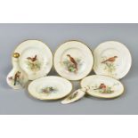 FIVE SMALL ROYAL WORCESTER PLATES AND TWO SCENT BOTTLES PAINTED WITH BIRDS, the larger scent