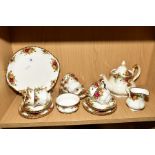 A ROYAL ALBERT OLD COUNTRY ROSES TEASET, six settings, seconds quality bread and butter plate,