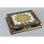 A VICTORIAN JENNENS & BETTRIDGE PAPIER MACHE BOX, decorated glass inset to hinged lid (s.d.), velvet