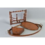 AN EARLY 19TH STRIPPED MAHOGANY AND ROSEWOOD FRAMED OVAL TRAY, with glass panel between twin brass