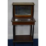 A LATE 19TH CENTURY MAHOGANY SIDE TABLE the top tier with a brass gallery and banding, central