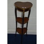 AN EARLY 19TH CENTURY FRENCH MAHOGANY THREE TIER STAND, each tier formed as a heart symbol with