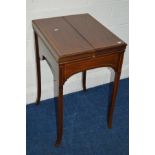 AN EDWARDIAN MAHOGANY SATINWOOD BANDED AND STRUNG WRITING TABLE, double fold over top enclosing a