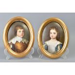 A PAIR OF 19TH CENTURY KPM PORCELAIN OVAL PLAQUES, painted with portraits of a 17th Century boy