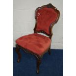 A VICTORIAN CARVED WALNUT CHAIR, by Johnstone and Jeanes, with foliate and scrolled decoration to