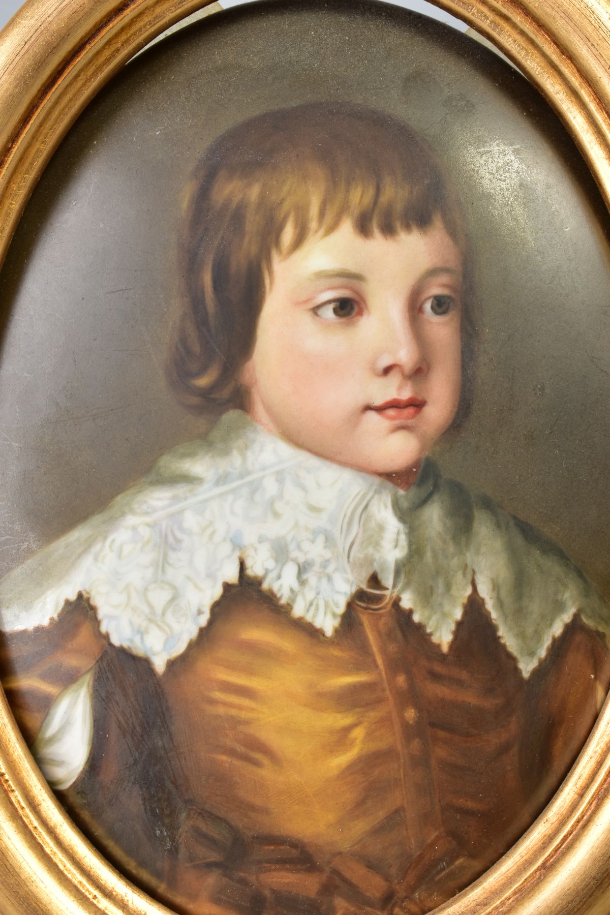 A PAIR OF 19TH CENTURY KPM PORCELAIN OVAL PLAQUES, painted with portraits of a 17th Century boy - Image 2 of 4