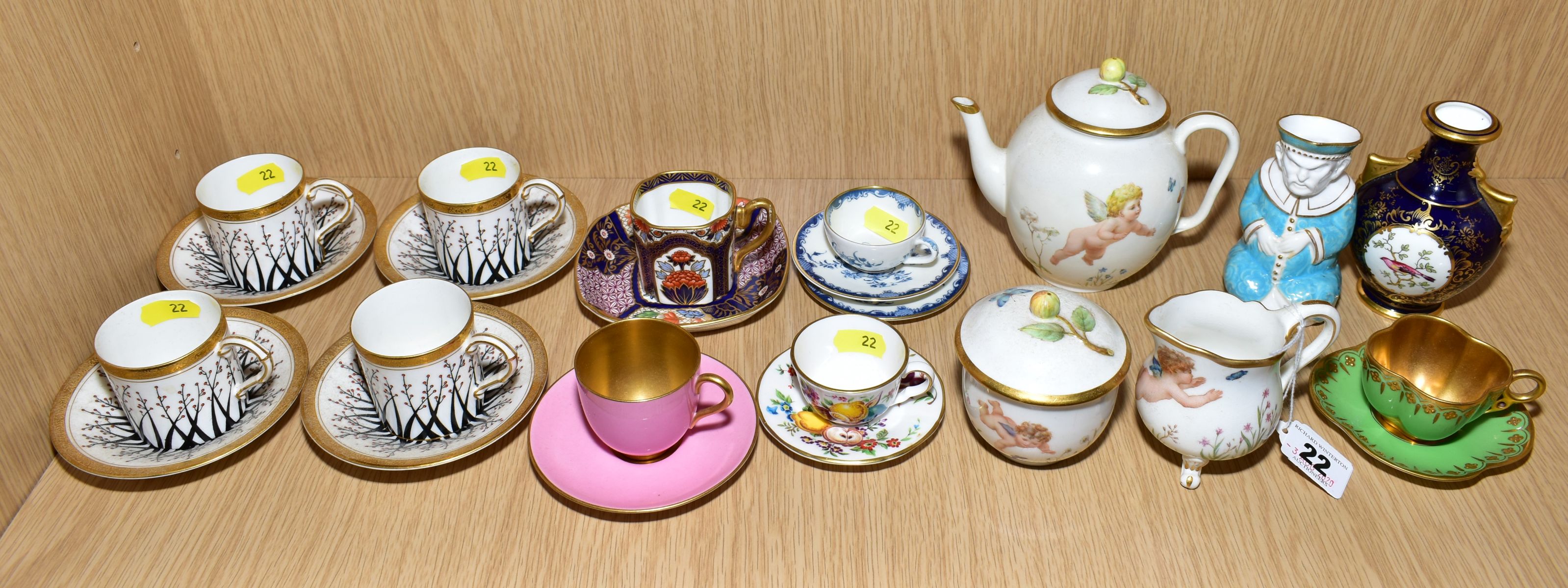 A COLLECTION OF ROYAL WORCESTER COFFEE CANS AND SAUCERS, MINIATURE ITEMS, ETC, including a three