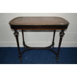 A LATE 19TH CENTURY EBONISED AND AMBONYA BANDED CENTRE TABLE with brown leather inlay top, on four