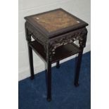 A CHINESE HARDWOOD SQUARE TABLE with a veined marble panel above raised foliate decoration and a