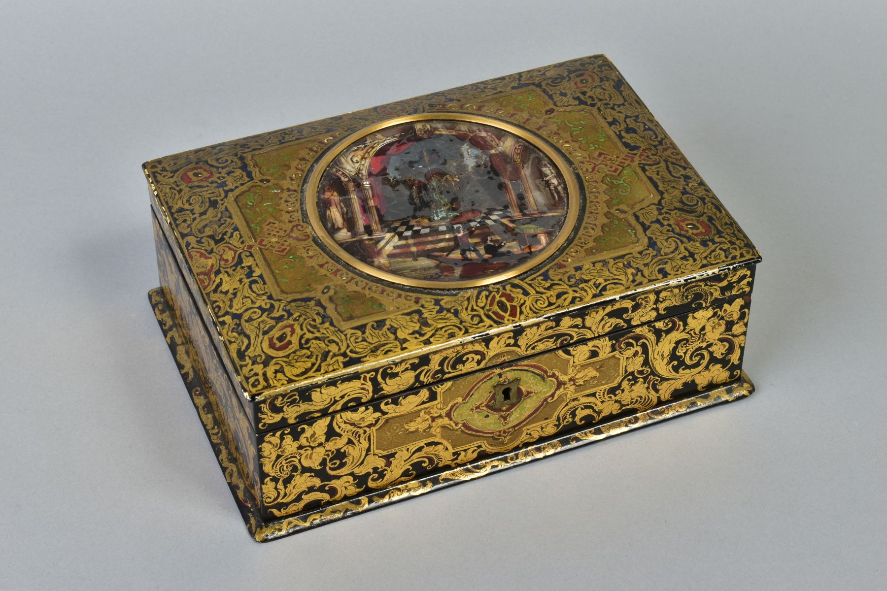 A VICTORIAN PAPIER-MACHE BOX BY CLAY, decorated throughout with gilt foliage, the hinged lid inset