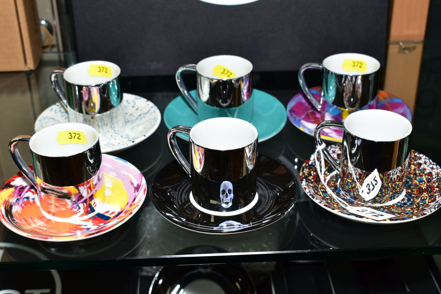 DAMIEN HIRST (BRITISH 1965), A PORCELAIN ESPRESSO SET comprising six different design saucers and - Image 3 of 10