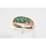 A 9CT GOLD FIVE STONE RING, set with five graduated oval cabochon turquoise, to a plain polished