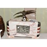A RECTANGULAR MARBLE ART DECO MANTLE CLOCK WITH BANDED HALF COLUMNS AT EITHER SIDE, a brass sea bird