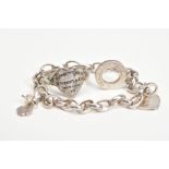 A THOMAS SABO BRACELET TOGETHER WITH A SILVER HEART SHAPED RING, the Thomas Sabo charm bracelet with