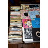 A WOODEN TRAY CONTAINING OVER TWO HUNDRED 7'' SINGLES, from the 1960's to the 1980's, including