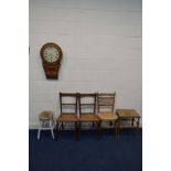 AN EARLY 20TH CENTURY MAHOGANY AND INLAID DROP DIAL WALL CLOCK, together with three cane seated