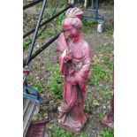 AN ORIENTAL STYLE COMPOSITE GARDEN FIGURE, of a lady in oriental dress carrying a fan, 99cm high,