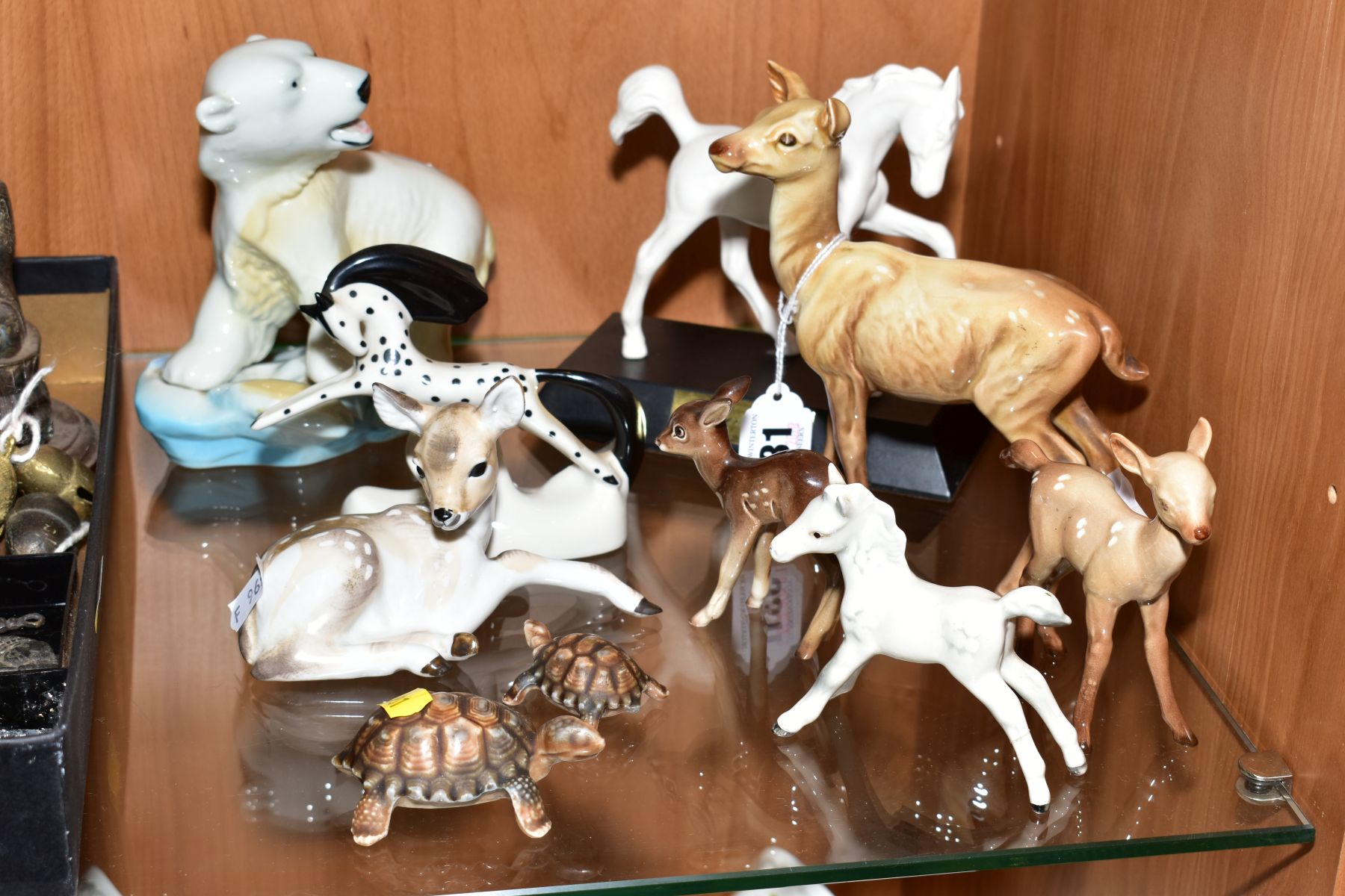 A GROUP OF ANIMAL FIGURES, to include Beswick Doe No999A and Fawn No1000B, Foal No997 (white, leg