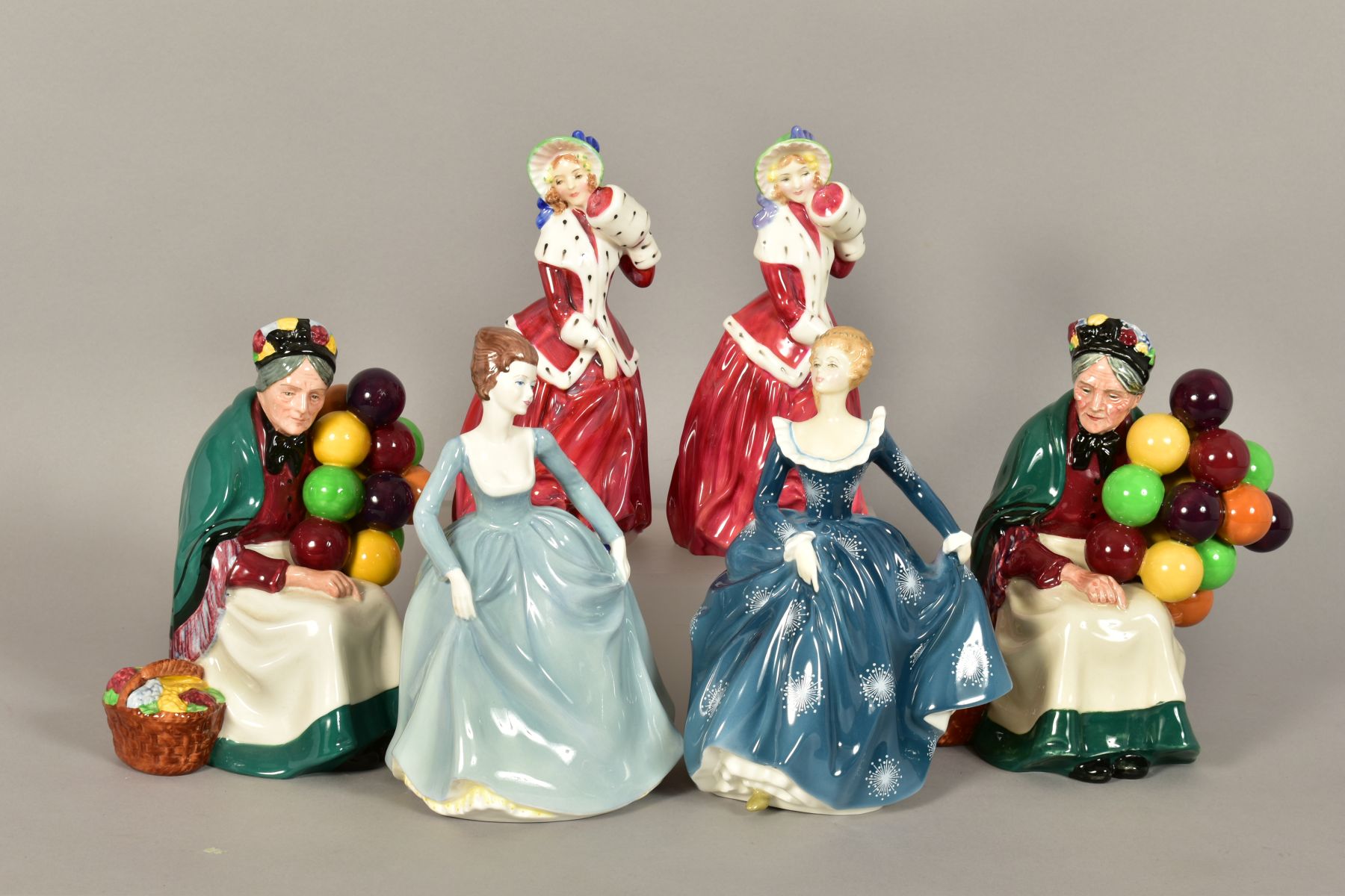 FIVE ROYAL DOULTON FIGURES 'Fragrance' HN2334, two 'The Balloon Seller' HN1315 and two 'Christmas