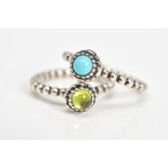 TWO PANDORA BIRTHSTONE RINGS, the first set with a central peridot cabochon, to the beaded shank,