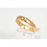 A 22CT GOLD WEDDING BAND, the plain polished band with a 22ct hallmark for Birmingham, ring size