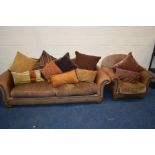 A BROWN LEATHER AND UPHOLSTERED TWO PIECE LOUNGE SUITE, with various cushions, comprising a three