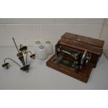 A MAHOGANY CASED SINGER SEWING MACHINE, together with a retro ebonised and brass triple branch