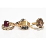 A SELECTION OF SEVEN 9CT GOLD RINGS, to include a diamond ring, set with a single cut diamond within