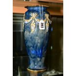 A ROYAL DOULTON VASE, approximate height 27cm, decorated around with raised swags of vine flowers