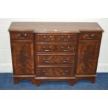 A MODERN BEVAN FUNNELL STYLE MAHOGANY BREAKFRONT SIDEBOARD, with eight various drawers and two