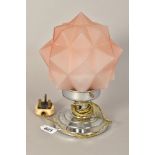 AN ART DECO CHROME TABLE LAMP, with geometric moulded pink glass shade, stepped circular base,