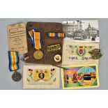 BROWN LEATHER WALLET containing a WWI British War medal and Victory medal named to 40873 Pte J T