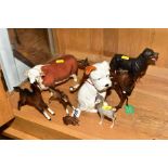 A GROUP OF EIGHT BESWICK ANIMALS, including seated puppy No308 (white/brown), Chamois No1551,